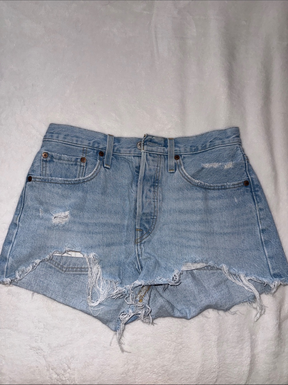 Levi’s Light Wash Distressed Denim Cutoff Shorts